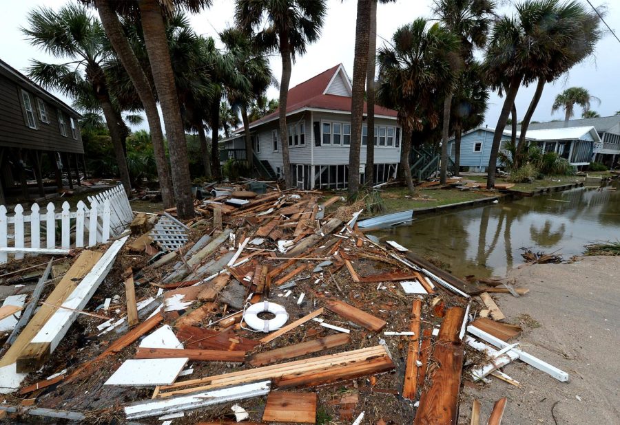 Photo courtesy of Jeff Siner / Tribune News Service Debris from a destroyed home in the Town of Edisto Beach, S.C., lays strewn across Palmetto Boulevard into a neighbors yard on Saturday, Oct. 8, 2016, following Hurricane Matthew and damaging winds.