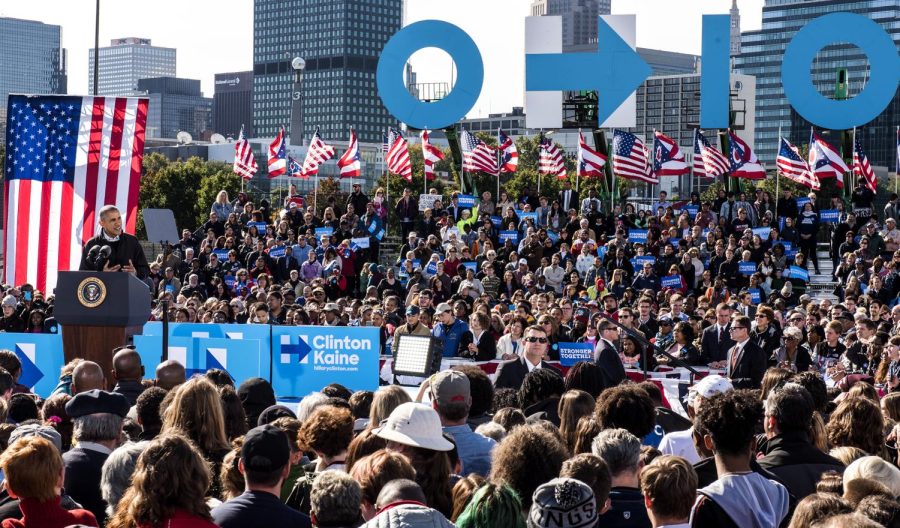 President Barack Obama speaks to supporters of Democratic presidential nominee Hillary Clinton at Burke Lakefront Airport in Cleveland, Ohio, on Friday, Oct. 14, 2016.