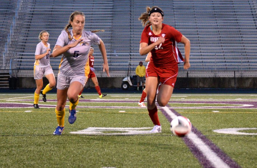 Junior Hayden Pascoe chases after the ball against Northern Illinois on Friday, Sept. 30, 2016 at Stow-Munroe Falls High School.