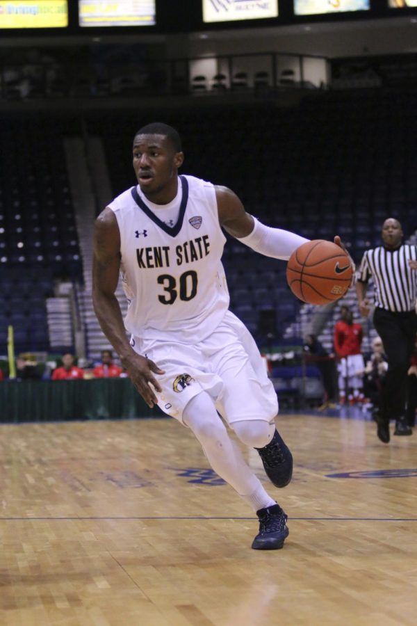 Senior guard Deon Edwin of the Kent State men's basketball team dribbles down the court at game one of the Gulf Coast Showcase in Estero, Florida, on Monday, Nov. 21, 2016.