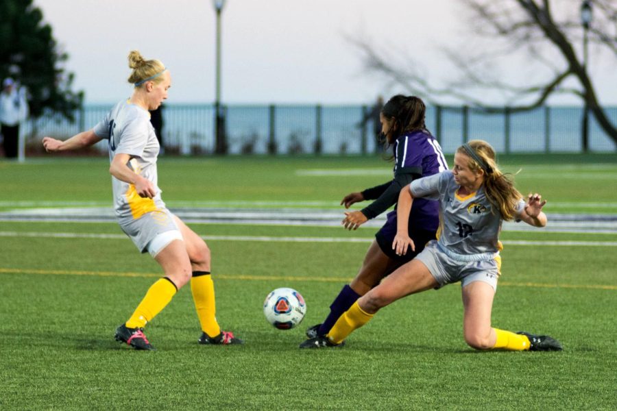 Kent State redshirt junior forward/mid-fielder Donavan Capehart (left), and junior mid-fielder Kristen Brots, (right), take on a Northwestern University player during the first game of the NCAA championship in Evanston, Illinois, on Saturday, Nov. 12, 2016. Kent State lost 3-0 in the first round of the Division 1 Women's College Soccer Tournament.