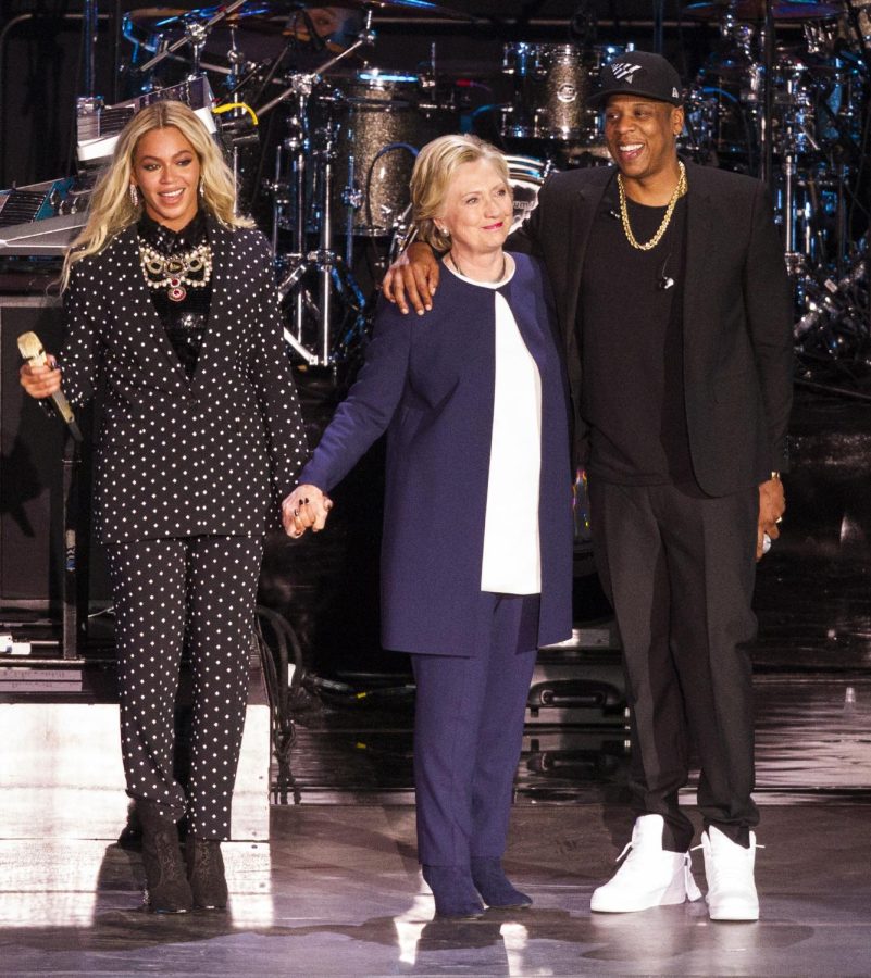 Beyonce and Jay-Z pose with Democratic presidential nominee Hillary Clinton after their "Get Out The Vote" concert event in support of Clinton at Cleveland State University's Wolstein Center on Friday, Nov. 4, 2016.