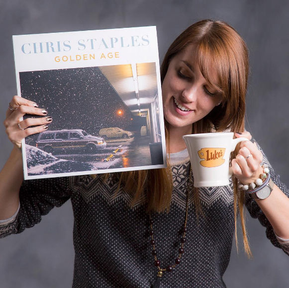 Photo courtesy of Melissa Olson via Gilmore Girls Soundtrack Blog. Melissa Olson, creator of the Gilmore Girls Soundtrack blog, shows off a Chris Staples album featuring a song from the first season. The Spotify playlist she built is called, "Spinning in Stars Hollow". 