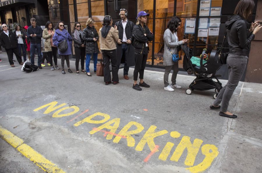 Voters wait in line outside the Estelle R. Newman Center in New York City on Tuesday, Nov. 8, 2016.