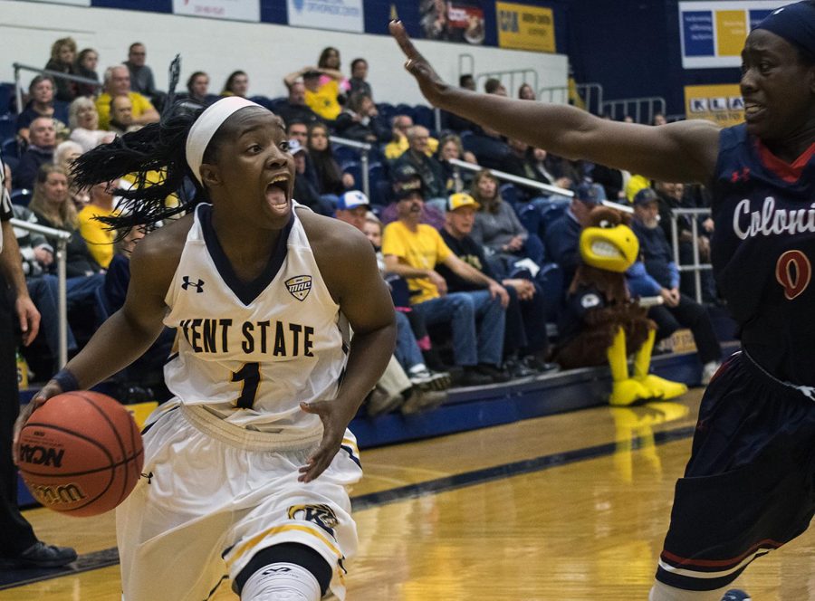 Junior guard Naddiyah Cross of the Kent State women's basketball team communicates with her teammates in overtime during the game against Robert Morris University game at the M.A.C Center on Saturday, Nov. 19, 2016