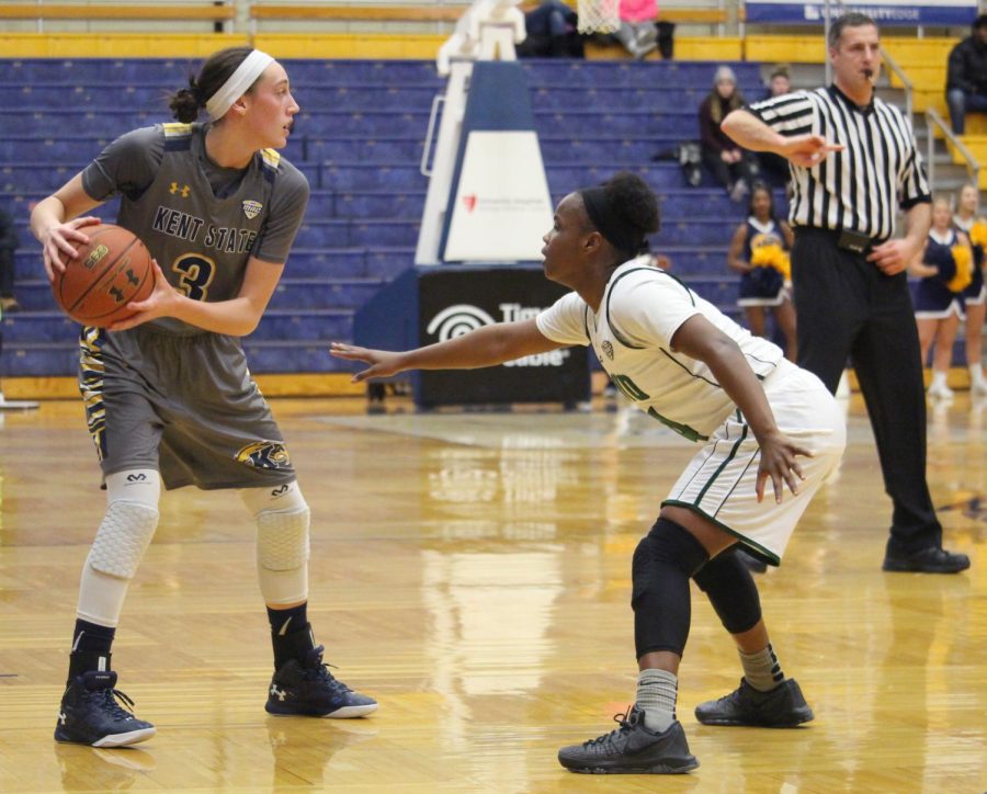 Kent State guard Larissa Lurken looks for an open pass to a teammate in Wednesday's game against Ohio University at the MAC Center. The Flashes lost 54-93. Jan. 20, 2016.