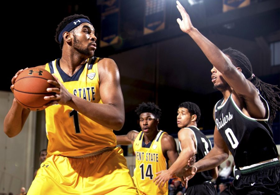 Sophomore center Adonis De La Rosa looks to pass the ball against Wright State University on Sunday, Dec. 18, 2016 at the M.A.C. Center. The Flashes lost, 68-63.