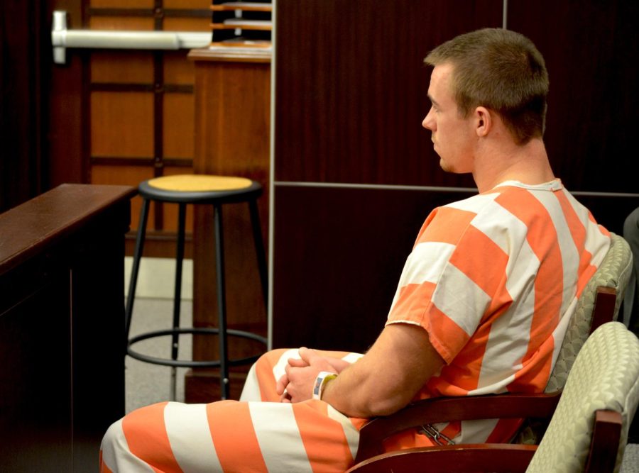 Nate Holley, Kent State senior, waits his arraignment at the Portage County Municipal Court in Ravenna. Holley was arrested Friday afternoon on charges of first degree felony kidnapping. His bond is set at $50,000 accompanied by a court-mandated GPS device.