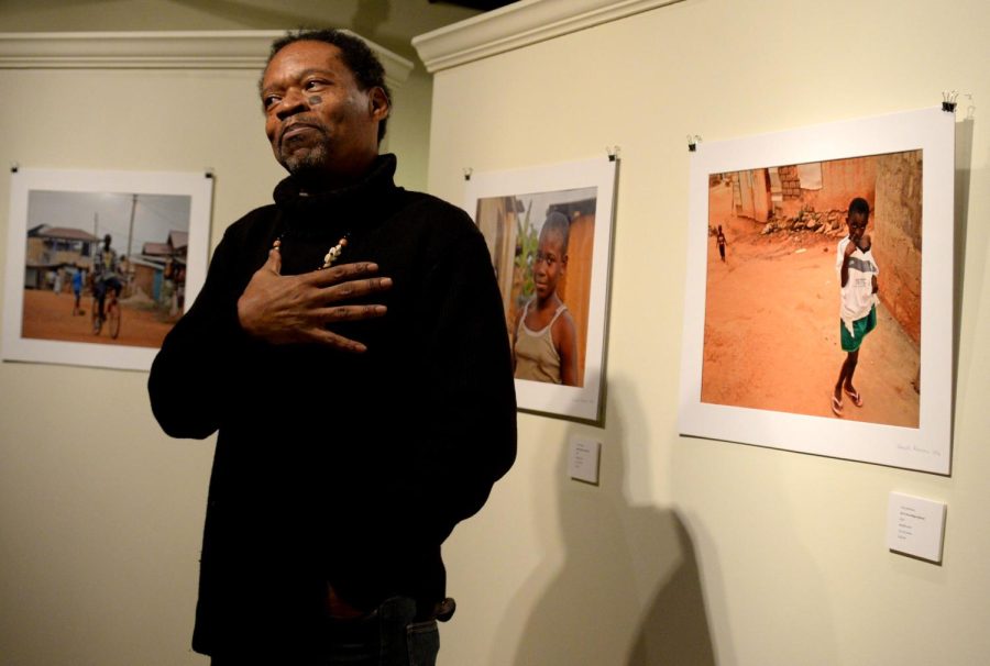 Photographer and Kent State alumnus Vince Robinson presents his gallery opening, "The Real Africa: Images from Ghana," in Oscar Ritchie Hall Thursday, Jan. 26, 2017. Robinson introduced the stories behind his photography and even recited poetry for the crowd.