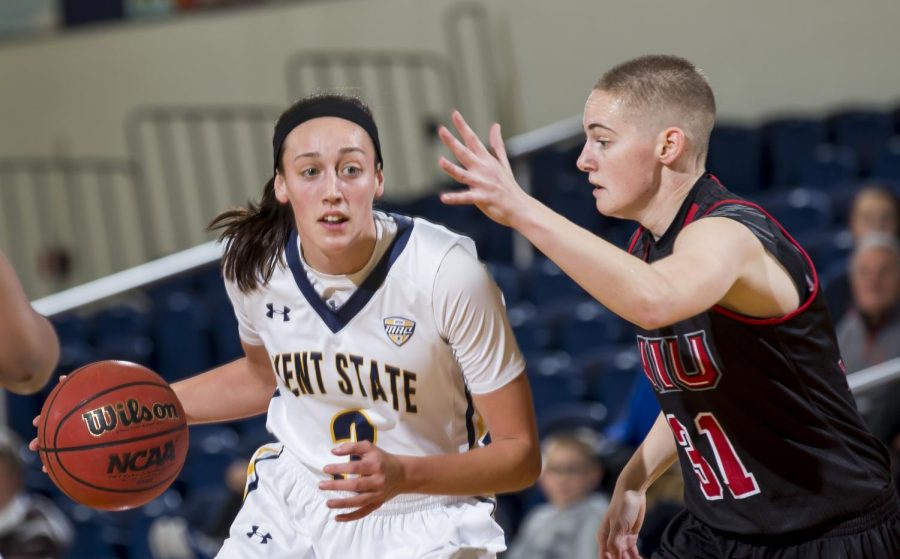 Kent State senior forward Larissa Lurken drives into the lane against Northern Illinois University senior guard Ally Lehman at the M.A.C. Center on Wednesday, Jan 11, 2017.