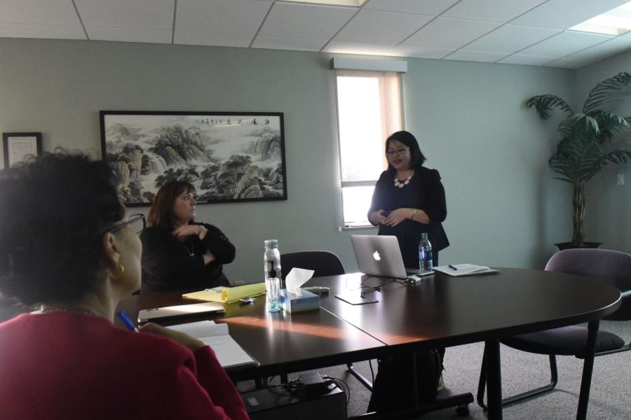 Candidate for the science education position, Elizabeth de los Santos, presents a colloquium to Sonya Williams, left, and Denise Morgan on Next Generation Science Standards on Thursday, Jan. 19, 2017.