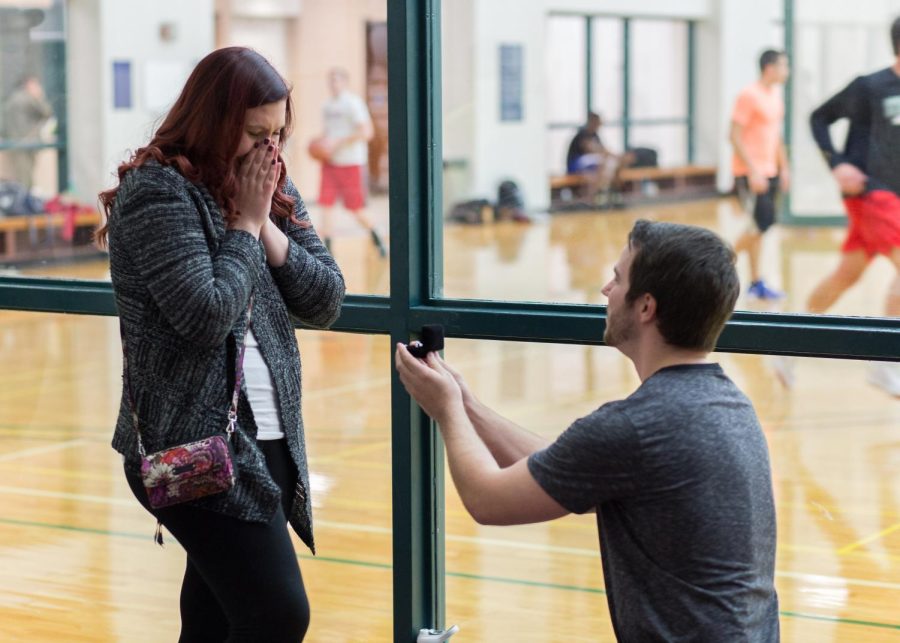 Kent State alum Mark Gupko proposes to senior psychology major Rebecca Kozak inside the Student Recreation and Wellness Center on Friday, Nov. 18, 2016.