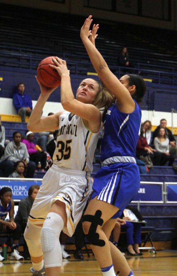 Junior forward Jordan Korinek of the Kent State women's basketball team drives to the basket during a game on Wednesday, Nov. 30, 2016 in the M.A.C Center.