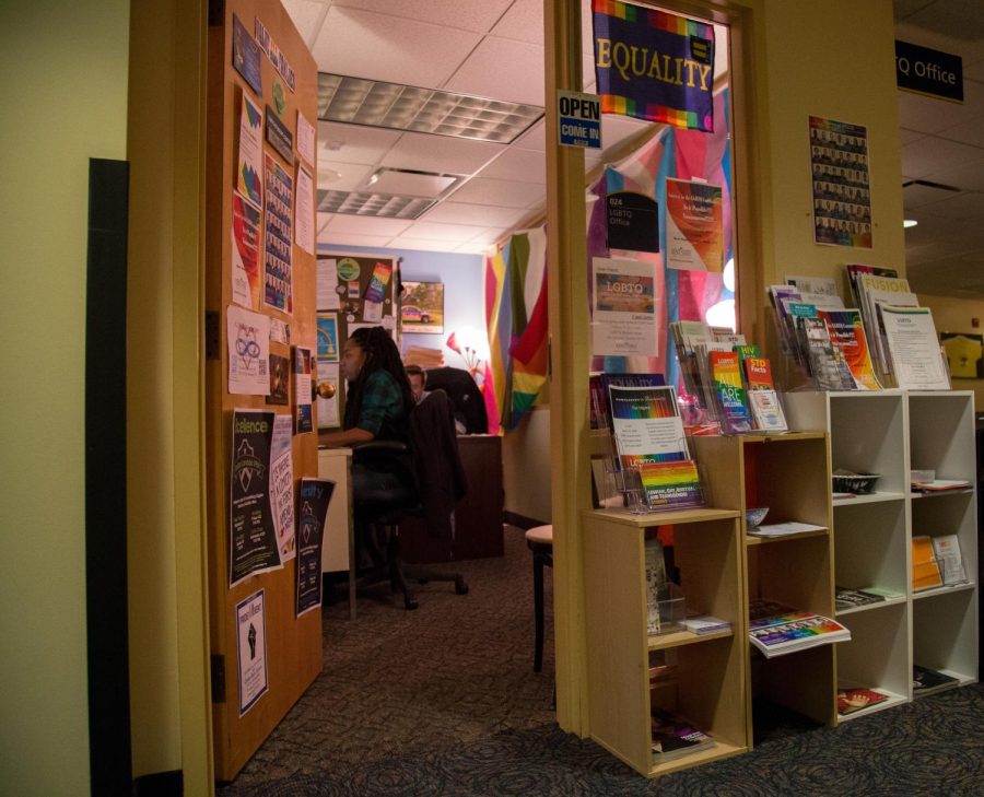 Ken Ditlevson, director of the LGBTQ Student Center, and Cierra Williams, then graduate assistant, work in the LGBTQ Office on Wednesday Feb. 3, 2016. 