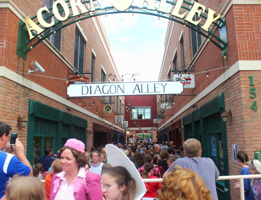 Harry Potter enthusiasts crowd 'Diagon Alley' in downtown Kent's Acorn Alley for Potterfest on Saturday, July 30, 2016. 