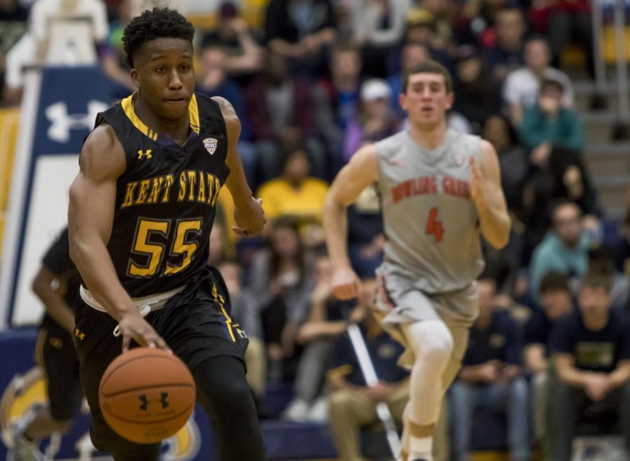 Kent State junior guard Kevin Zabo dribbles the ball up court against Bowling Green State University at the M.A.C. Center on Tuesday, Feb. 7, 2017. Kent State lost in overtime, 84-83.