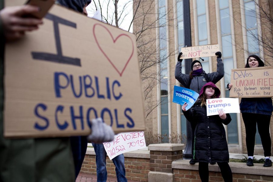 Kent State students participate in a walk out in response to the appointment of Betsy DeVos and Rob Portman's confirmation of her for Secretary of Education February 7, 2017. Kent State University was founded as a college for rural teachers over 100 years ago.