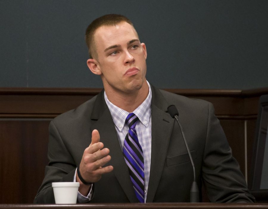 Defendant and former Kent State football player Nate Holley gives his testimony during day two of the Ohio v. Nathan Holley trial at the Portage County Municipal Courthouse in Ravenna, Ohio, on Wednesday, Feb. 8, 2017.