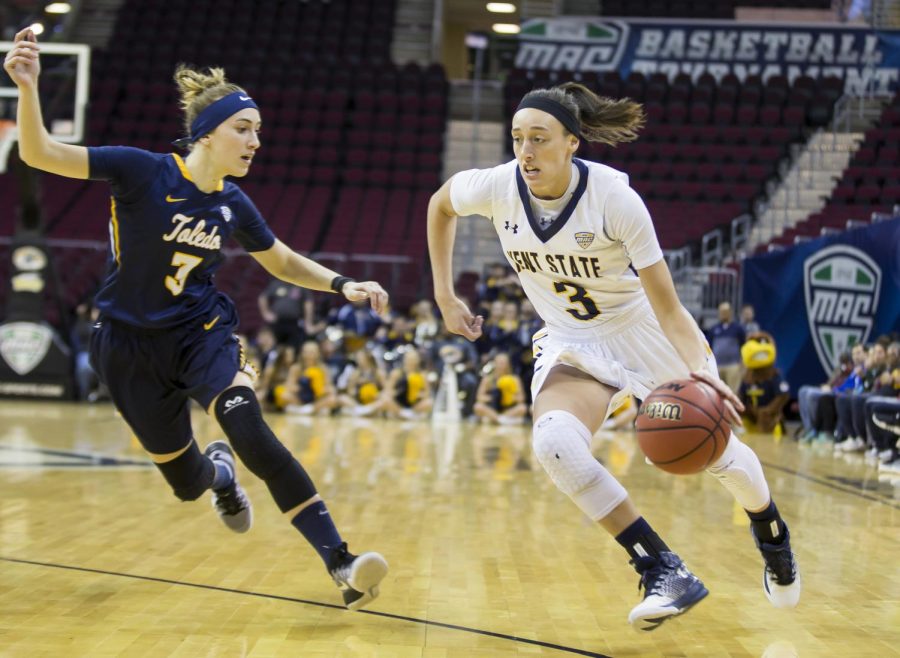 Kent State senior guard Larissa Lurken drives on Toledo freshman guard Mariella Santucci during the quarter-finals of the MAC Tournament at Quicken Loans Arena in Cleveland, Ohio on Wednesday, March 8, 2017. Nate Manley / The Kent Stater