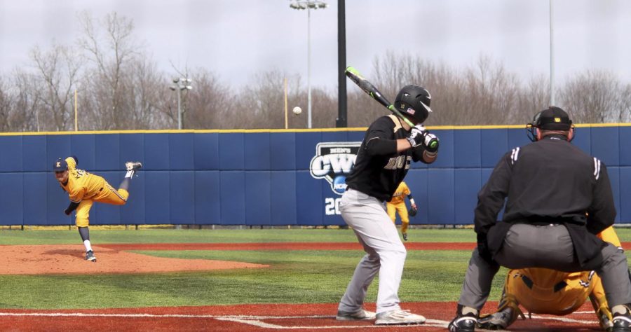 Eli Kraus, a sophomore left-handed pitcher, pitches to a Western Michigan University player during a game at Olga Mural field at Schoonover Stadium on Sunday, April 30, 2016. The Flashes won 13-2.