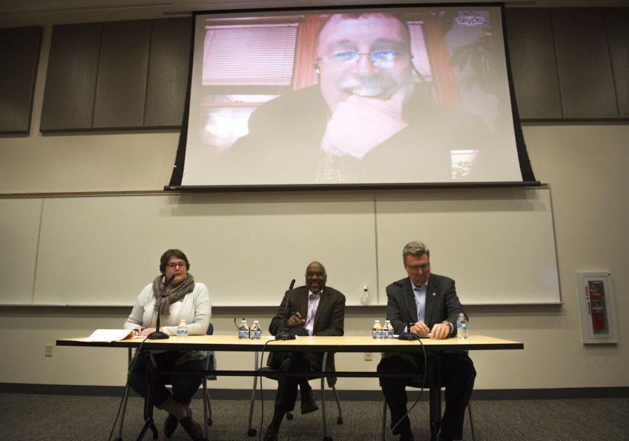 Matt Carroll, former reporter for the Boston Globe and member of the Spotlight team, Kim Garchar, associate professor of philosophy, Jim Crutchfield, former president and publisher of the Akron Beacon Journal, and Thor Wasbotten, direction of the School of Journalism and Mass Communication answer questions as apart of a panel discussing ethics of investigative journalism after screening the film "Spotlight" during their “Media at the Movies” event on Tuesday, March 7, 2017.