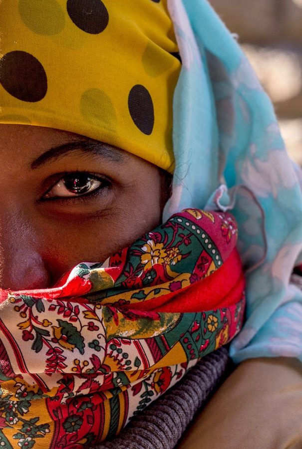 A Somali refugee protests outside a government building in Florence on Saturday, Jan. 14, 2017. She and many others had been displaced from an apartment building with no notice given by the government.