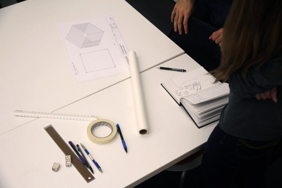 Barkitecture members gather materials to begin designs for the Kitty City, an indoor habitat for cats at the Humane Society of Summit County.