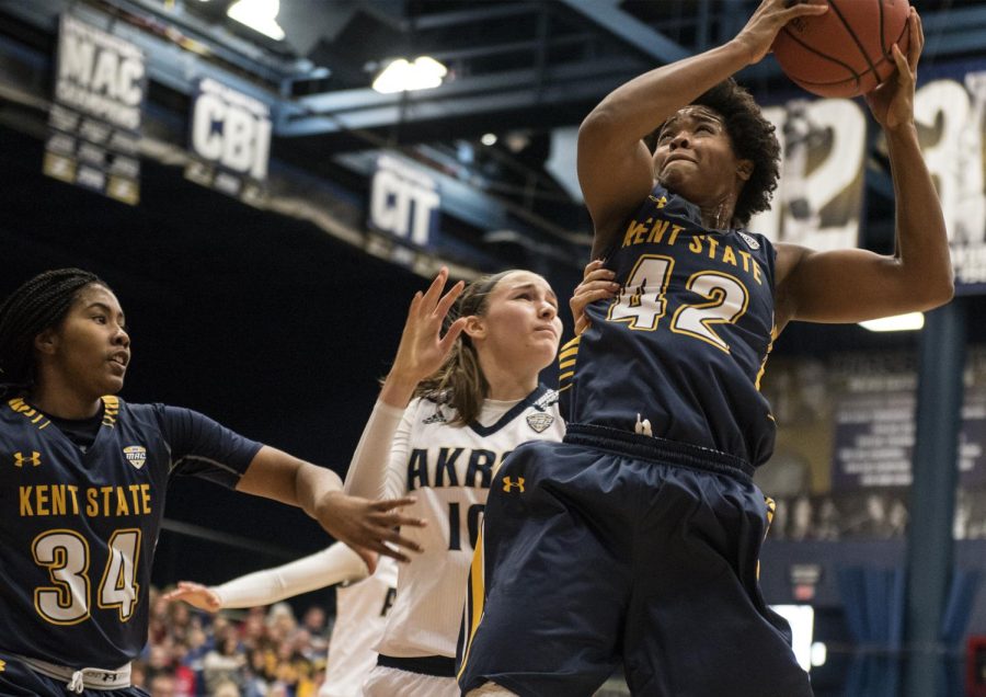 Kent State senior forward Chelsi Watson of the women's basketball team comes down with the offensive rebound against The University of Akron Zips at the James A. Rhodes Arena on Saturday, Feb. 11, 2017.