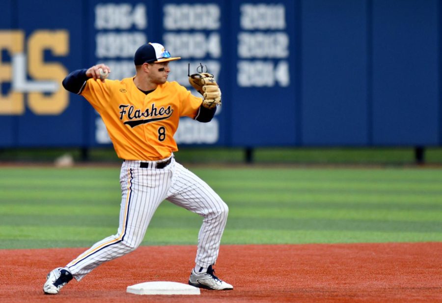 Kent State senior infielder Dom Lero throws from second base to first base against Youngstown State on Tuesday April 4, 2017. Kent lost 11-6.