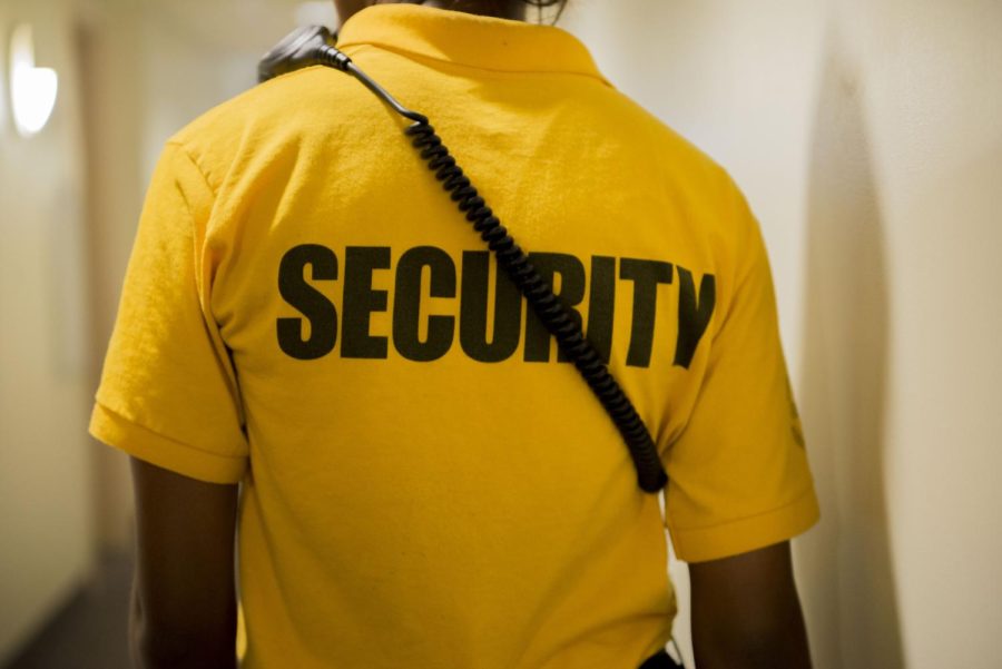 Junior Criminology &amp; Justice Studies major Kelli Shumate completes a round through Stopher Hall on Wednesday night, April 12, 2017 while on duty as a campus security guard. Each night, campus security guards complete rounds through the dorms to make sure doors stay locked and appliances are not left on.