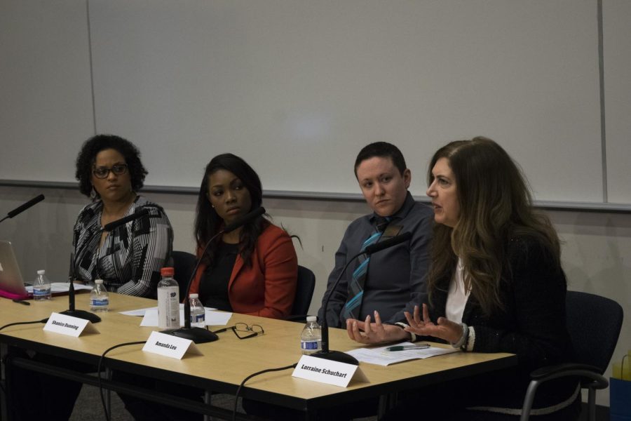 Traci Williams, senior lecturer in Kent State's School of Journalism and Mass Communication; Shanice Dunning, a Channel 19 reporter; Amanda Leu, a coordinator in the College of Communication and Information Office of Academic Diversity Outreach; and Lorraine Schuchart, CEO of Prosper for Purpose, discuss the Breaking Down Barriers discussion at Franklin Hall on Wednesday, April 12, 2017.