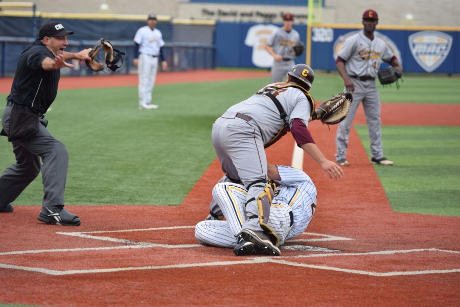 Junior infielder Dylan Rosa is called safe at home plate to bring in another run  for the Golden Flashes against Central Michigan on Friday, April 28, 2017. Kent State won, 9-7.