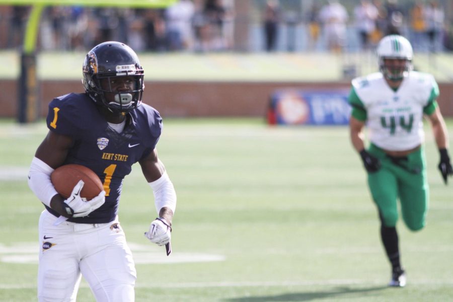 Then-Kent State freshman wide reciever Antwan Dixon runs for a 47-yard touchdown on the Flashes’ opening drive of the Kent State vs Marshall game on Sept. 26, 2015. Kent State lost in double overtime, 36-29.