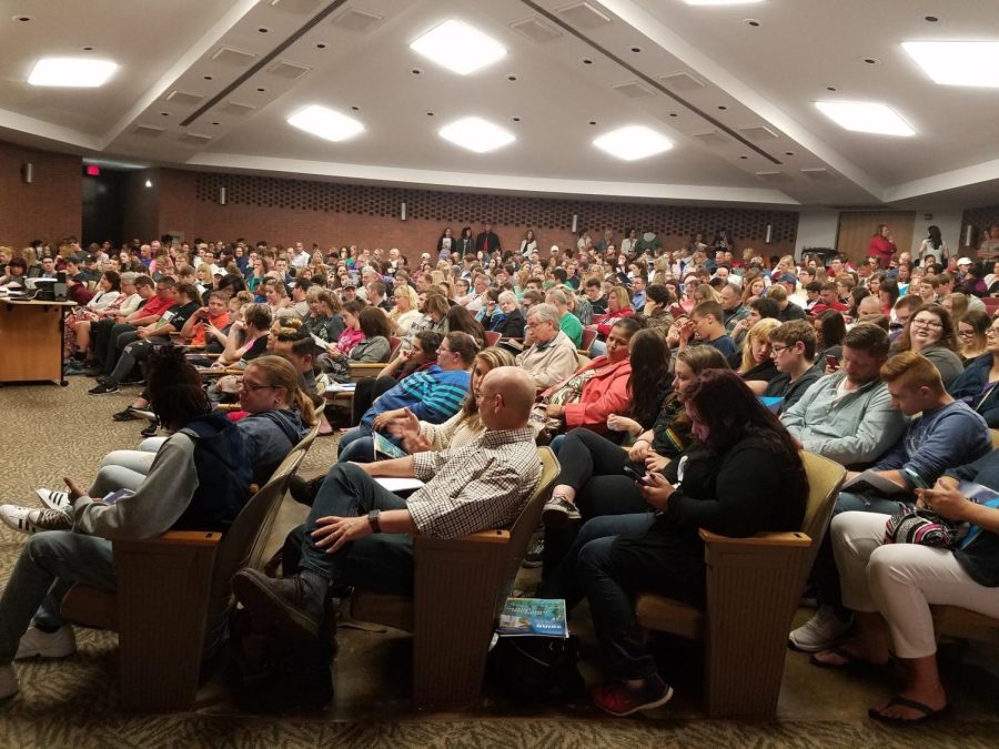 Students and parents wait in the auditorium of Main Hall at Kent Stark while latecomers are directed to the overflow room. Kent Stark held an information session for middle school and high school students regarding the College Credit Plus program on Thurs., May 25, 2017.