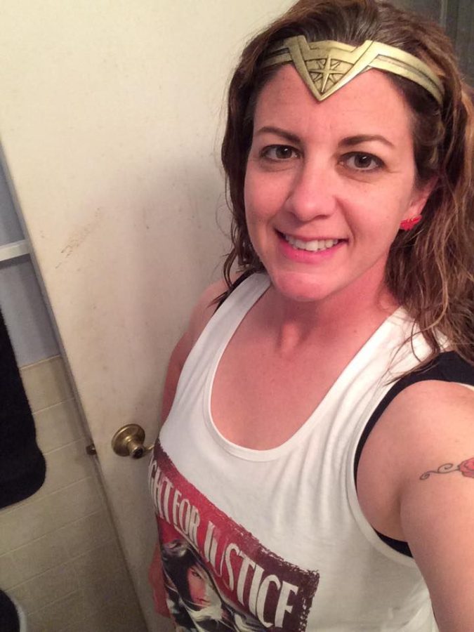 Officer Tricia Knoles of the Kent State University police wears Wonder Woman's tiara