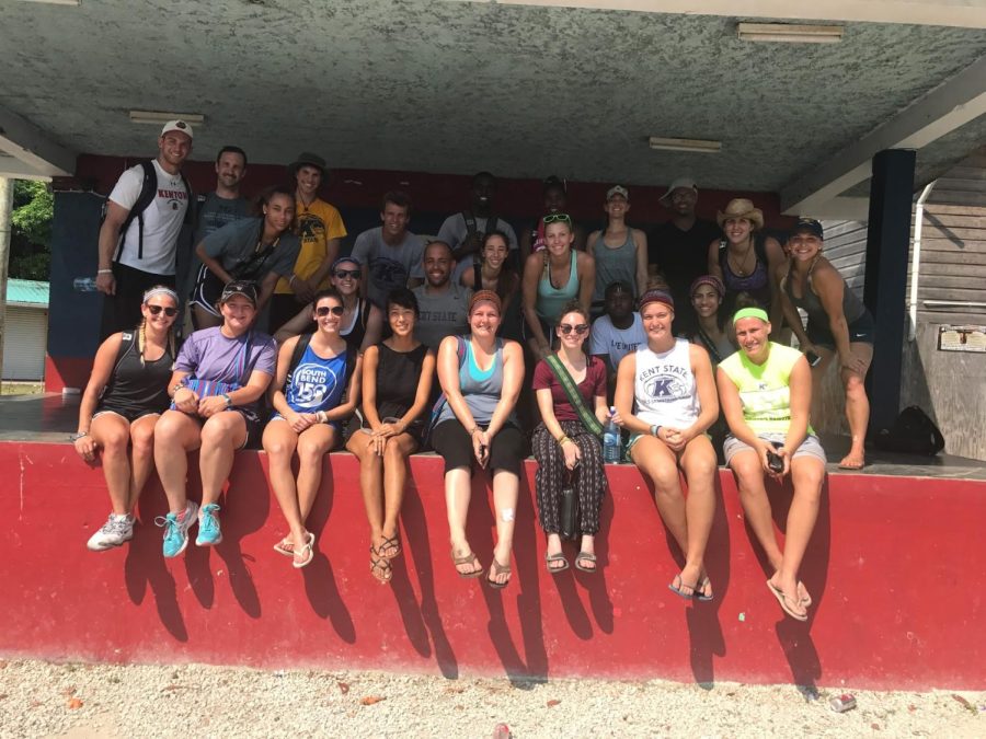 Students and Staff pose for a picture in Belize during Kent State's partnership with Courts for Kids.