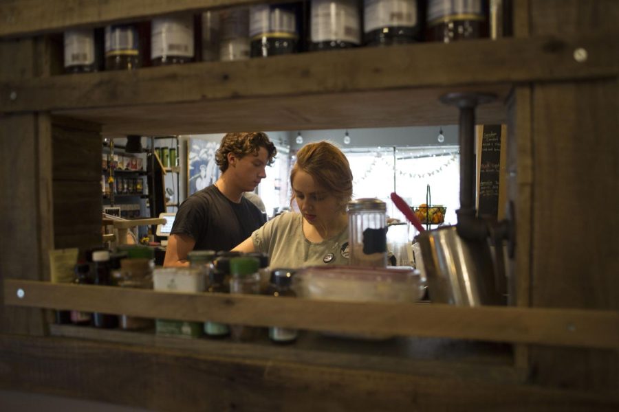 Senior Marrisa Shepard and sophomore Antonio DeJesus prepare coffee at Scribbles Coffee on Saturday, April 15, 2017.