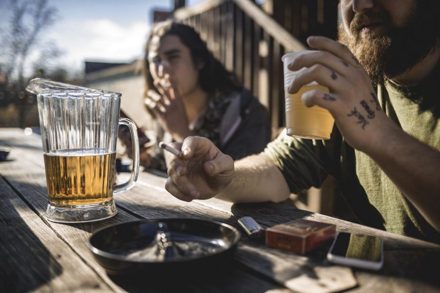 Spring weather brings out all kinds of spirits. Bryce Lunde and Gordon Zeniseck enjoy a pitcher of beer on the Zephyr Pub patio Wednesday afternoon April 5, 2017.