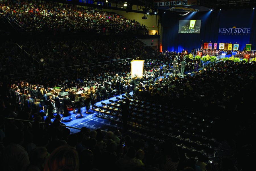 The School of Nursing graduating students walk to their seats at the 2016 Summer Commencement in the MAC Center on Saturday, Aug. 20, 2016.