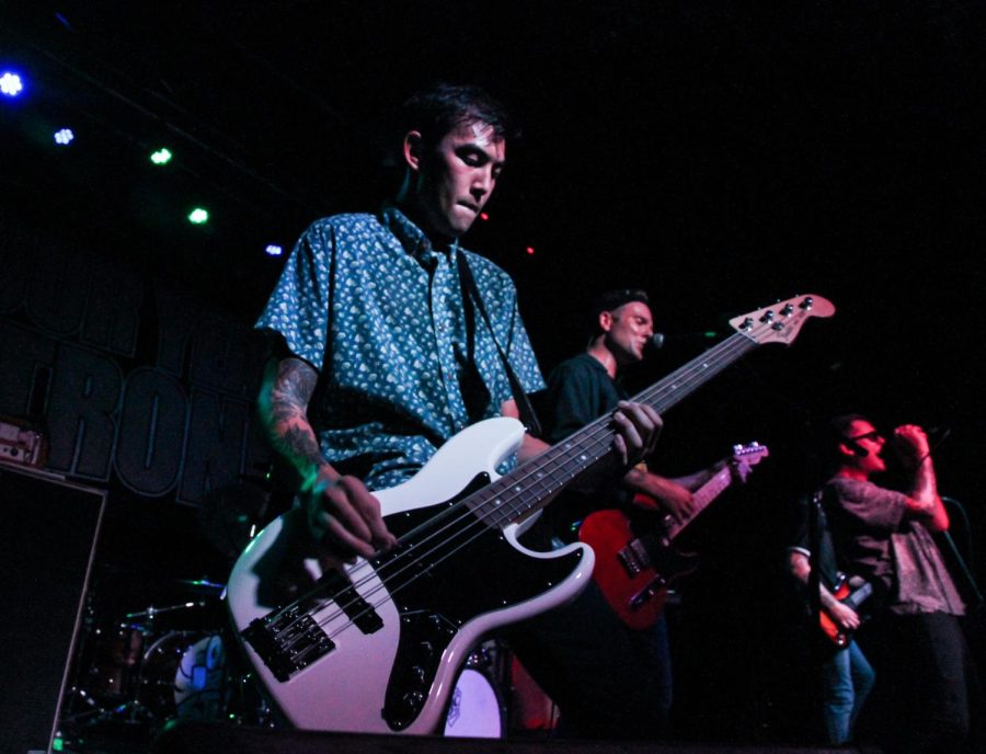 Adam Shoji, bassist for Seaway, performs on stage at the Agora Ballroom.