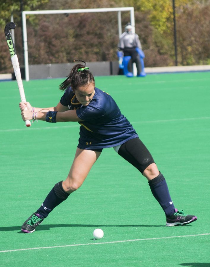 Midfielder Jessica Nesbitt swings at the ball during the Kent State v. Missouri State University field hockey game on Sunday, Oct. 9, 2016.