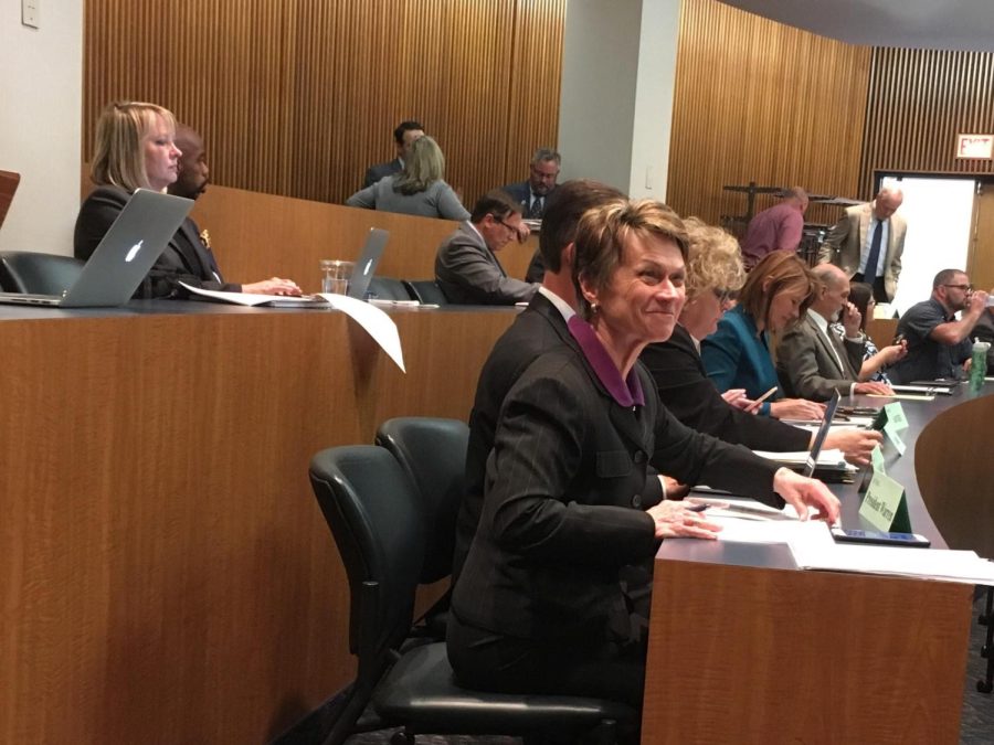 President Beverly Warren watches Faculty Senate Chair Deb Smith as she gives her opening remarks at the Faculty Senate meeting Monday Sept. 11, 2017. 