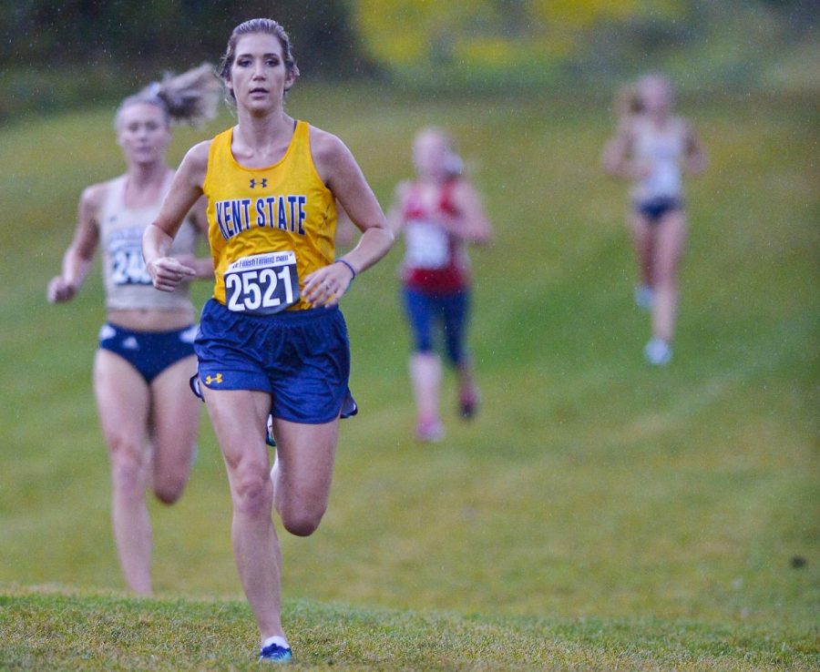 Freshman Maddie Dunlap runs during a cross country meet on Thursday, Sept. 7, 2017.