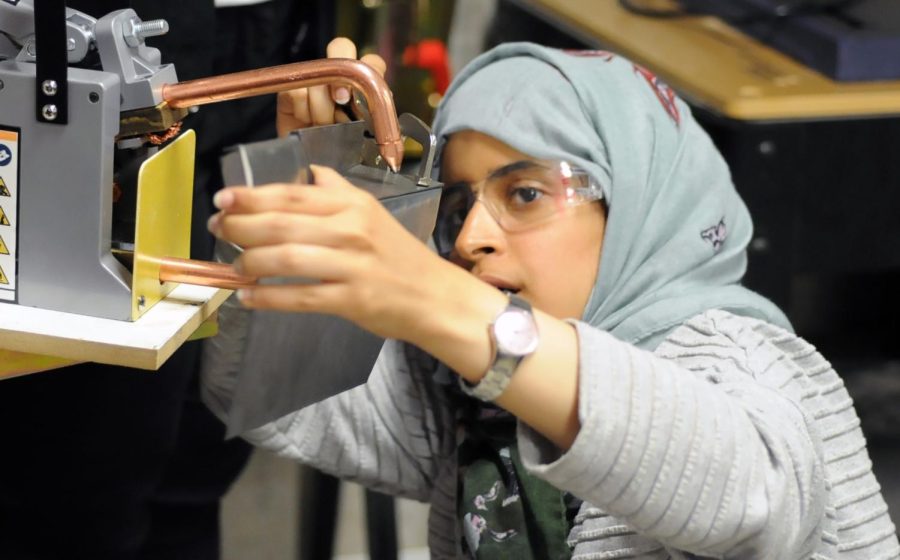 Aroub Baajajah of Saudi Arabia works on a project during the Effat program in the fabrication laboratory at the Center of Architecture and Environmental Design.