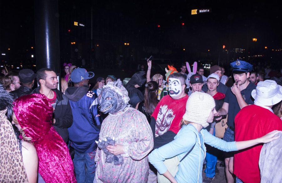 The corner of Water Street and Main Street, littered with costumed partygoers during downtown Kent’s Halloween on Saturday, Oct. 29, 2016.