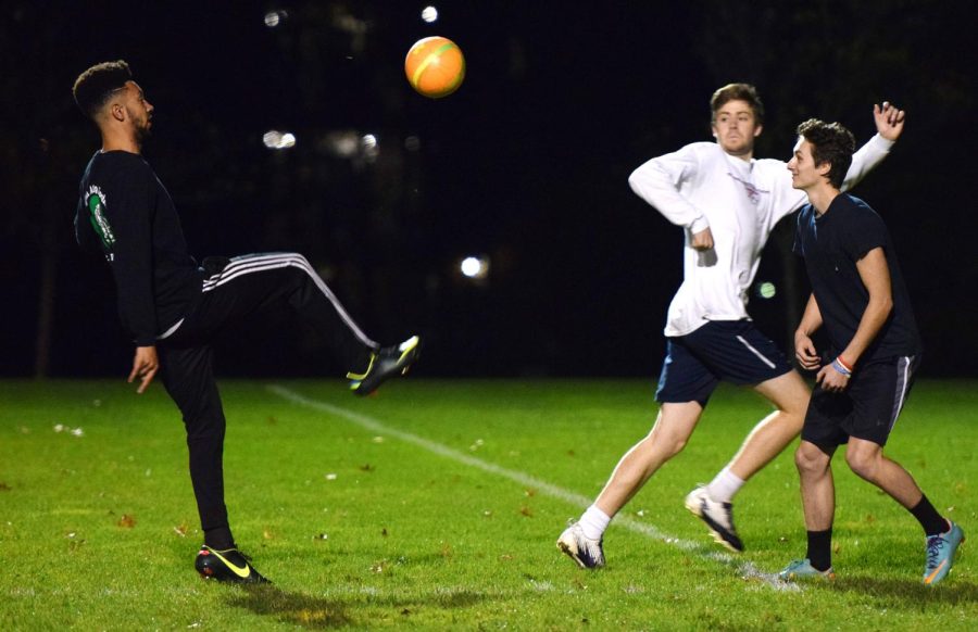 Bradley Banks, a junior exercise science major, kicks the ball toward the goal during an intramural soccer game on Thursday.