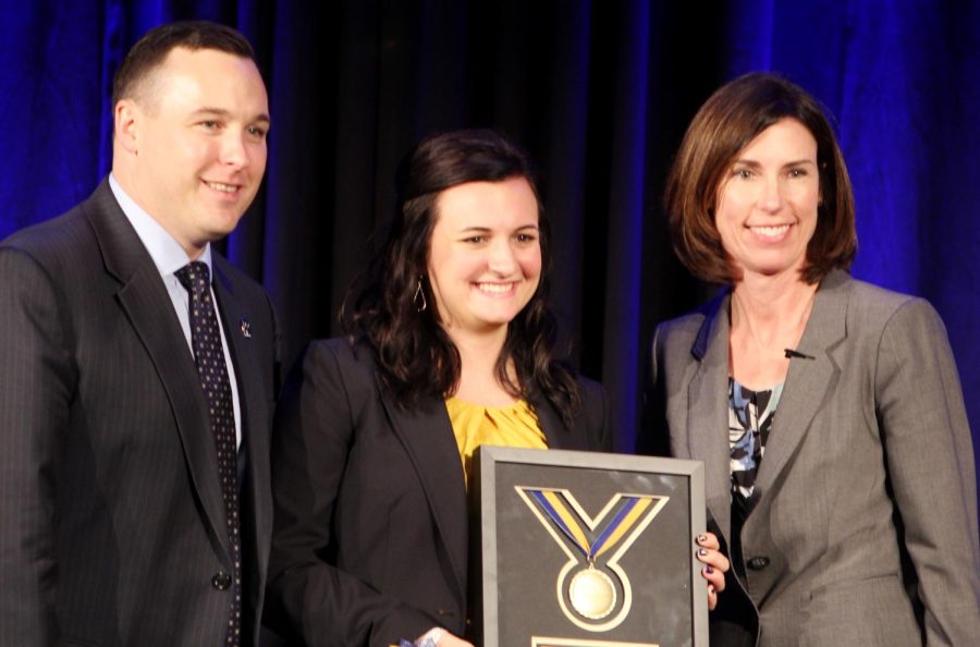 Marisa Stephens, a senior managerial marketing major, accepts the “Golden Flash” award during the Alumni Awards ceremony on Friday, Oct. 13, 2017. Stephens won the only student award this year and was later crowned as Homecoming Queen.