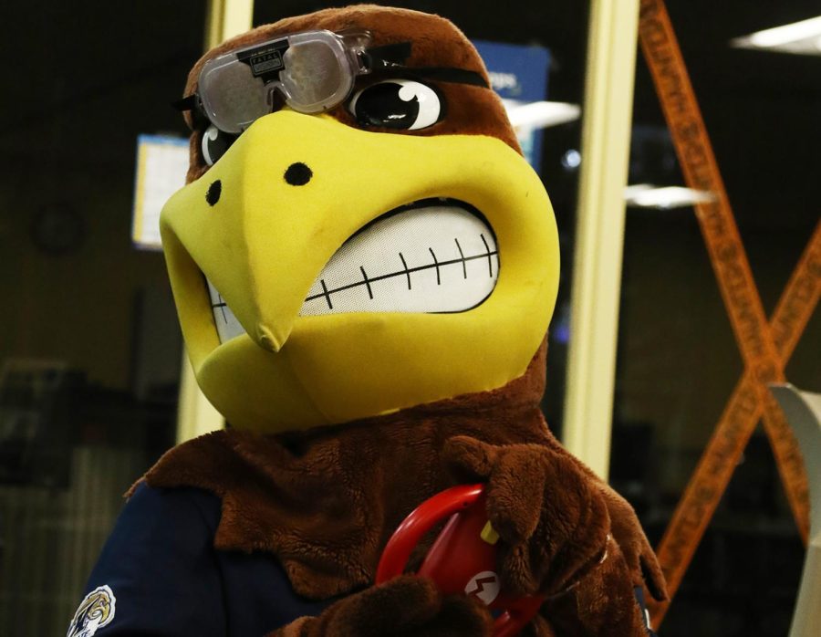 Flash plays drunk Mario Cart during the Haunted Library event. The “beer goggles” Flash wore mimic the visual impairment someone under the use of alcohol would experience. “It’s to bring awareness to alcohol use while driving," said Tricia Knoles, the community resource officer for the Kent State Police Department.