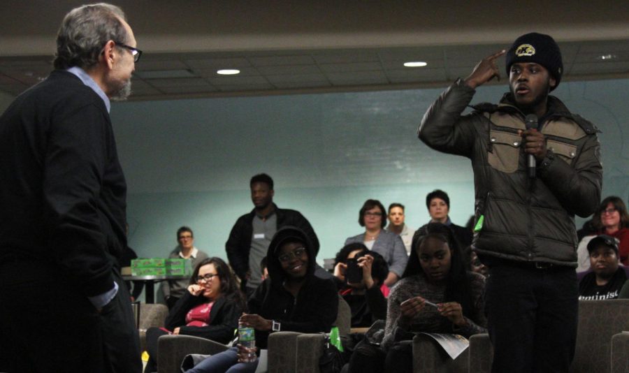 Dr. Richard Serpe and Akhil Hill talk during the KENTTalks Let’s Talks Trump event in Tri-Towers rotunda on January 31, 2017. The event was held in order to help bring understanding to the different opinions on the recent presidential election.