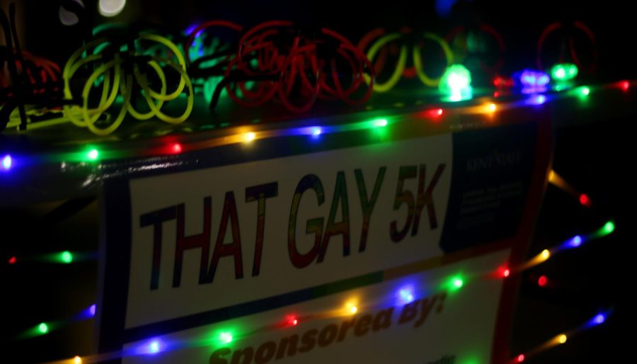 Glow-up glasses sit on a table outside Kent State's Liquid Crystal Institute during the That Gay 5K event Friday, Oct. 6, 2017. 